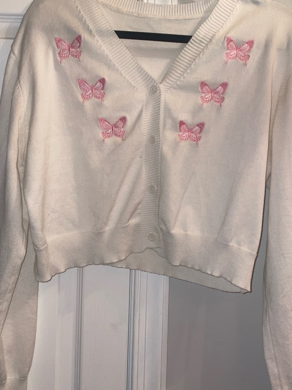 White sweater with butterfly embroidery. Large size.